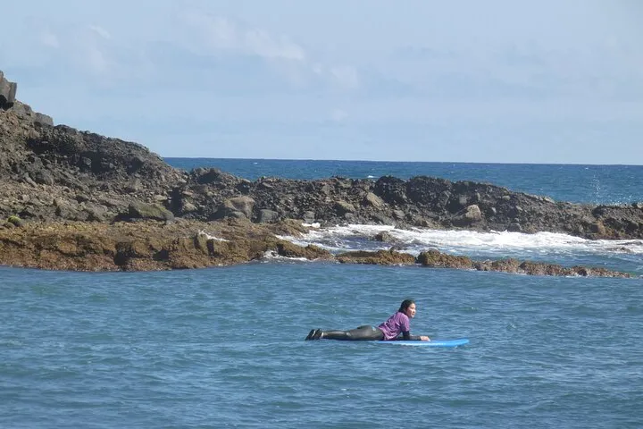 Surfing in a volcanic island